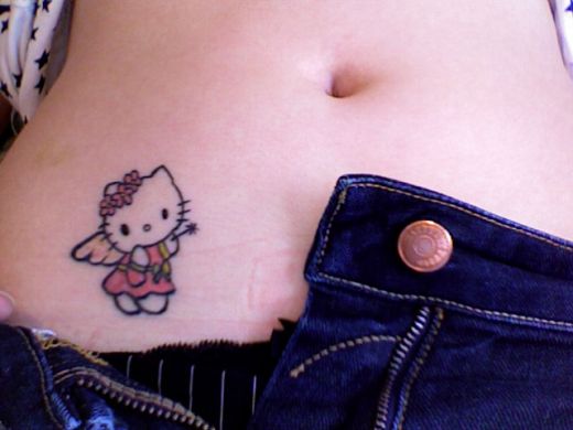 belly button tattoo. nice lil elly button,