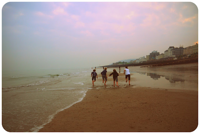 eastbourne beach seafront seaside children running