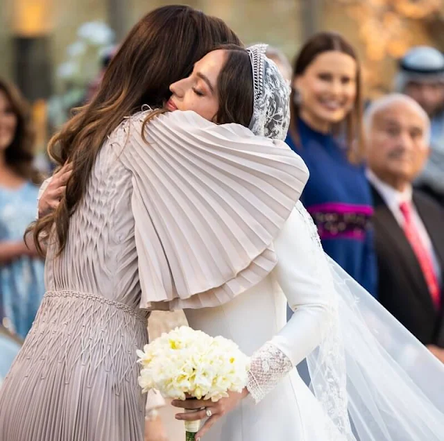 Queen Rania in Christian Dior gown. Princess Salma in Andrew Gn dress. Rajwa in Roksanda yellow dress. Iman in Chaumet tiara