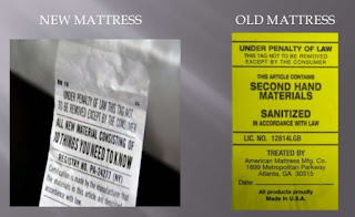 Tags from a new and a sanitized, refurbished mattress.