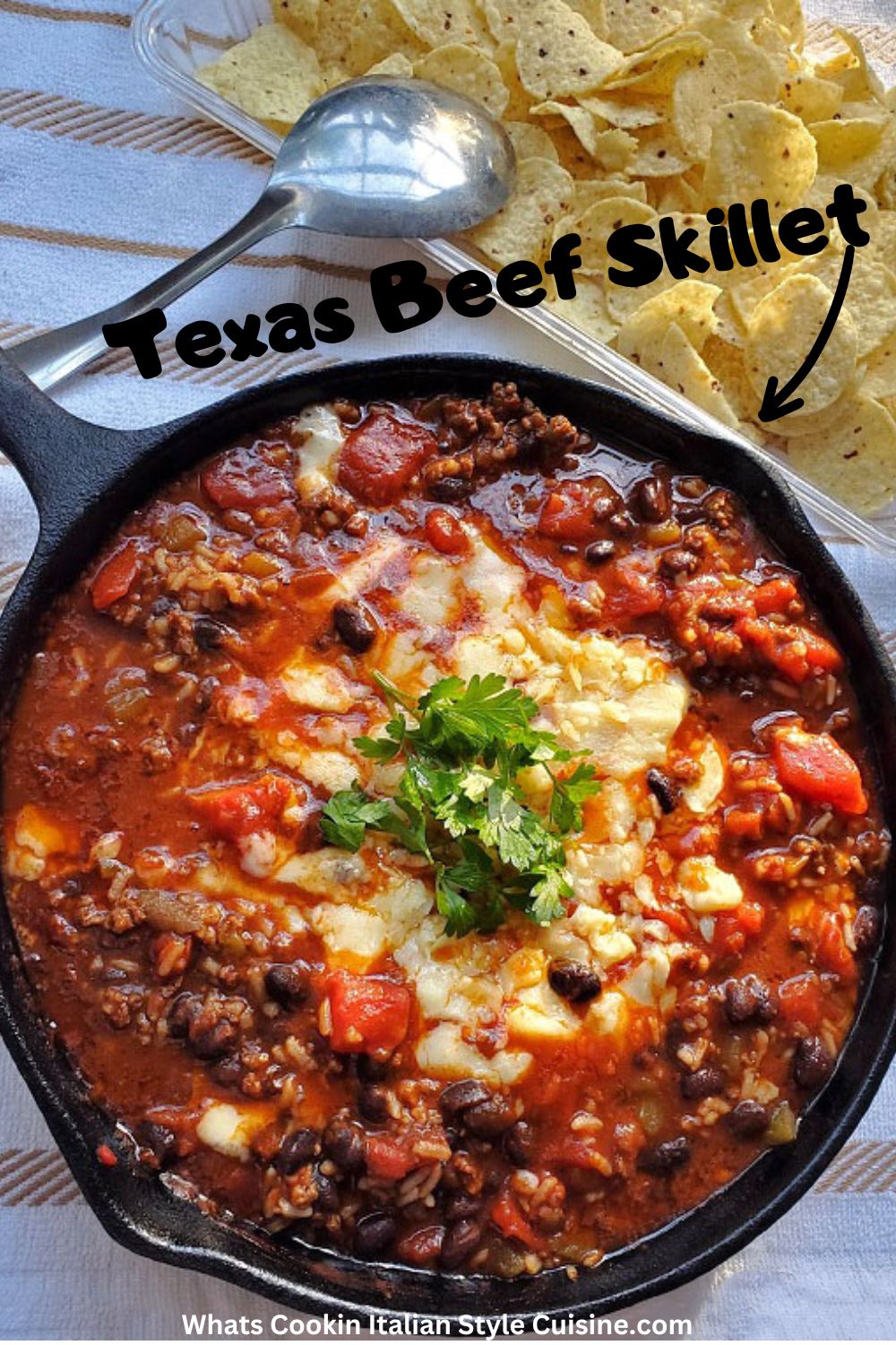 pin for later a skillet filled with rice beans and beef with sauce called Texas Beef Skillet