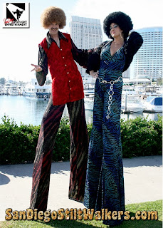 disco stilt walkers