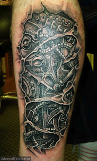 biomech tattoo on the calf