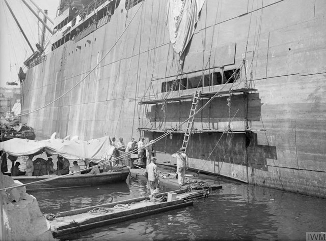 Damaged freighter Orari being patched at Malta, 3 June 1942 worldwartwo.filminspector.com