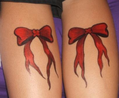 Bow Tattoo On Back Of Neck. ack of neck. tattoo bows.