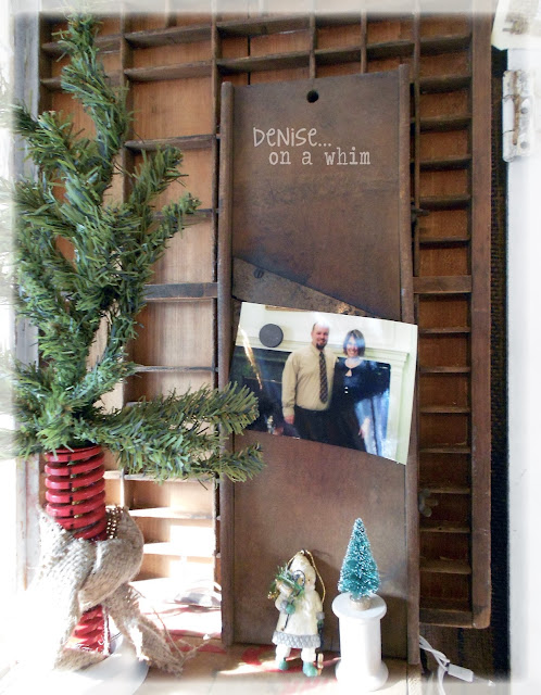 Vintage Cutter as Photo Frame in a Christmas Vignette via http://deniseonawhim.blogspot.com