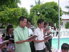 Some brethren were singing while Baptism is going on.