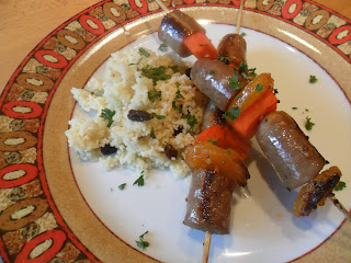 Sausage skewers and lemony couscous