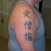 Arm Kanji tattoos