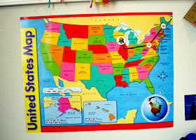 To help Tessa learn some of the states, she is mapping the Flower Friends' journey across the US. I bought an inexpensive United States map learning chart from Staples.com (free shipping for rewards members) to use and scanned in (flipped and reduced) the sticker of Lupe and her petal-powered car found at the back of the The Daisy Girl's Guide to Girl Scouting. We use yarn, foil star stickers on circle cutouts, Scotch tape and poster putty to chart their progress.