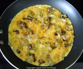 step two Cheesy Scrambled Eggs with Mushrooms and Onions