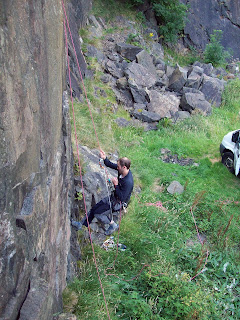 Ruaridh practising rope ascension in the quarry