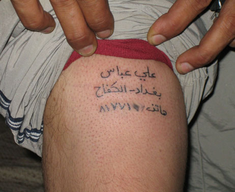 quote tattooed in cursive upon