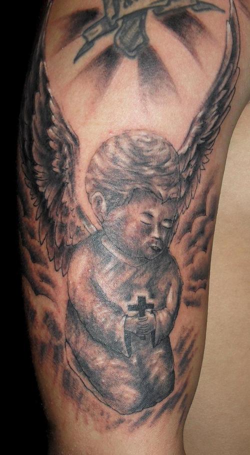 Tattoos Of Angels Praying. Praying boy angel with large