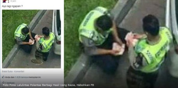 Foto Polisi Lalulintas Sedang Membagikan Uang Hasil Razia