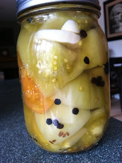 Pickled green tomatoes food in jars