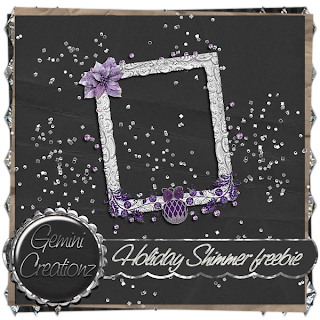 http://geminicreationz-byvickig.blogspot.com/2009/12/holiday-shimmer-cluster-frame-freebie-2.html