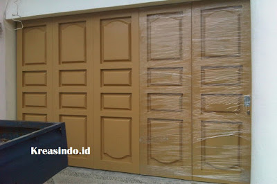 Jasa Pintu Garasi Besi Merk Hisen di Jakarta, Bogor, Depok, Tangerang, Bekasi, Banten, Bandung, dan Cirebon