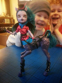 Monster High Freaky Fusion Hybrid Avea Trotter Doll with daft lads behind