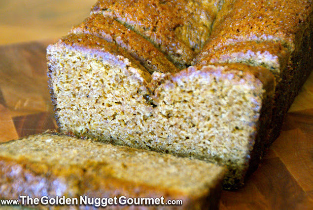 Sliced homemade pumpkin bread on a platter