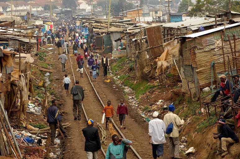 people walking in poor neighbourhood