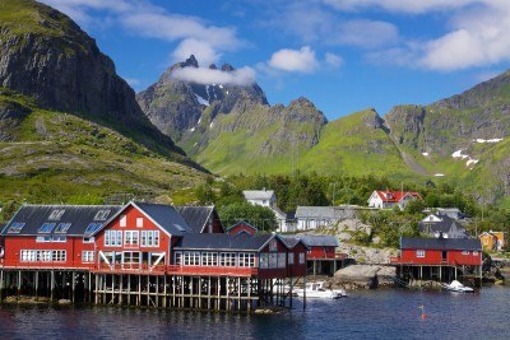 14712690-picturesque-village-on-lofoten-islands-in-norway-surrounded-by-high-peaks-of-mountains