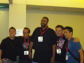 Dwayne McDuffie and the Secret Identities editors. Photo by Jimmy J. Aquino.