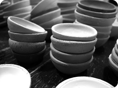 mini pottery bowls in piles