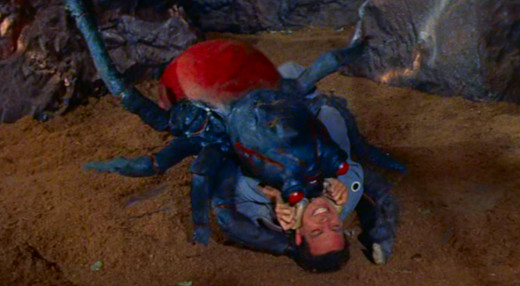 Screenshot - A giant spider attacks an astronaut in Queen of Outer Space (1958)