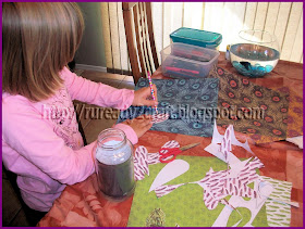 creating feathers for thanksgiving turkey jar