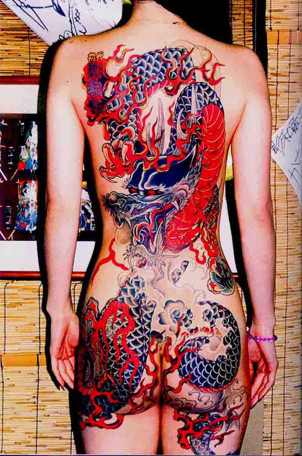 Female Tattoo With Japanese Dragon Tattoo On The Back Body