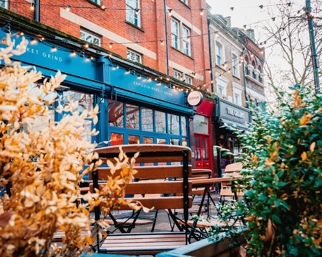 Outdoor seating area of a shop.