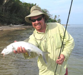 Photo of man holding a bonefish