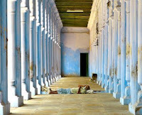 In the Indian heat, a man takes an outdoor nap. (Credit: Mohamed Somji, Flickr) Click to Enlarge.