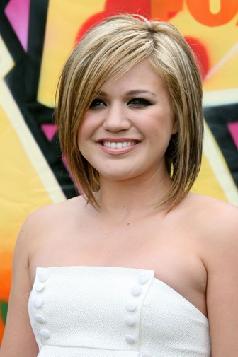 short haircuts for women with round faces. short hair styles for black