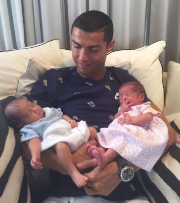 Cristiano Ronaldo poses for first snap holding newborn baby girl