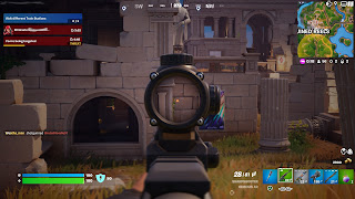 Taking aim with a scoped weapon in Fortnite.