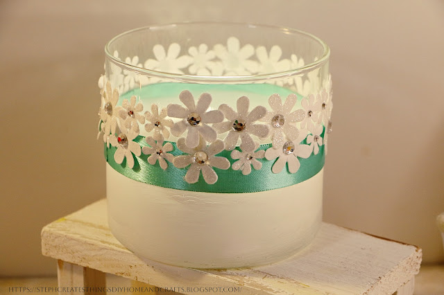 Shimmery flower glass jar light display