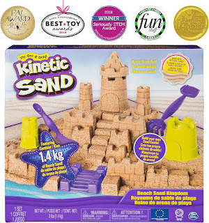 “Kinetic Sand Kingdom with castle molds and fold-out tray”