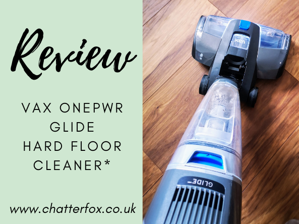 Image showing a picture of the VAX ONEPWR Glide Hard Floor Cleaner in use on oak effect laminate. Alongside a green square that contains the words review, VAX ONEPWR Glide Hard Floor Cleaner www.chatterfox.co.uk