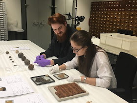 Max and Abi looking at Egyptian rush matting from the Archaeology collection