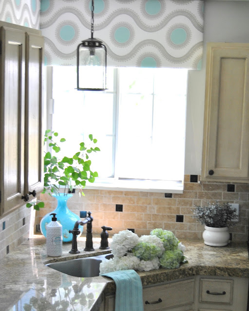 progress lighting, lighting, kitchen lighting, pendant, design, interior design, white kitchen, industrial kitchen, round kitchen table, box valance, kitchen, peninsula, white dining chair, oil rubbed bronze, black lighting, hydrangea, aloof gray, sherwin williams, gray