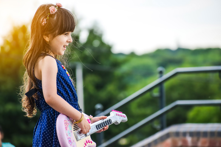 child playing guitar