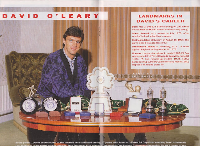 Extract from an Arsenal programme showing David O'Leary at home with his medals and trophies