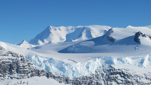 Beautiful Mountains of Antarctica Fully Covered with Ice