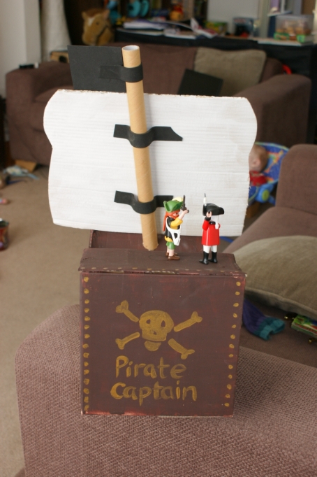 finished pirate ship with joey dressed in his pirate outfit