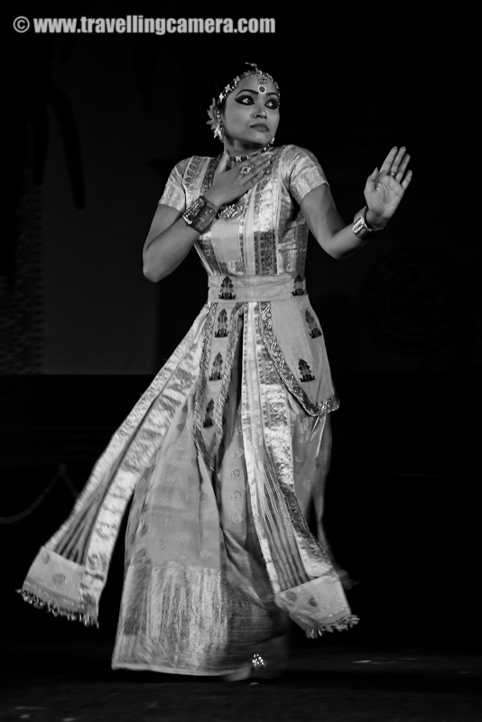 Sattriya Dance Performance during Rongali Bihu Festival @ Indira Gandhi national Center of Arts (organized by Assam Association, Delhi on 24th April 2011) : Posted by VJ SHARMA on www.travellingcamera.com : Sattriya Dance performances is one of the main highlight of Rogali Bihu Festival at IGNCA, Delhi ! And this performance was full of expressions and it seems these songs were telling some story which dancer was enacting through her steps !!!  Let's have a look at some of the photographs from Sattriya performance on 24th April, 2011 with relevant information about this particular form of Indian Classical Dance !!!Sattriya Nritya is one among eight principal classical Indian dance traditions. Whereas some of the other traditions have been revived in the recent past, Sattriya has remained a living tradition since its creation by the Assamese Vaishnav saint Srimanta Sankardeva, in 15th century AssamSankardeva created Sattriya Nritya as an accompaniment to the Ankiya Naat (a form of Assamese one-act plays devisdby him), which were usually performed in the sattras, as Assam's monasteries are called. As the tradition developed and grew within the sattras, the dance form came to be called Sattriya Nritya.The name 'Sattriya' has been derived from the word 'Sattra' which are religious Institutes set up by the Vishnava Saint Shrimanta Shankardev for preserving and propagation of tradition, culture and religion. It was coined centuries after and represents all that the Saint had created, which brought about a Socio-cultural Renaissance in the Assam Valley of INDIA !!!The Sattra style was evolved when Shankaradeva, a great artist and musician in himself composed 'Ankiya Bhaona' or 'Ankiya-Nat' (dance-dramas), devotional music- 'Borgeet', and the four sacred texts - “Kirtan', 'Dasam' 'Ghosa', 'Ratnavali' (the last two composed by Madhavdev). A School of Philosophical Learning emerged and a deeper understanding of life through the simple path of devotion brought one and all to the fold...Actually Sattriya dance of Assam is aclassical form of dance which is highly devotional in character with the spiritual aspect being predominant all through !!!This Dance form of Sattriya is like many of the other Classical Dance forms of India which has been extracted from a larger body of theatrical practices that constitute the Ankiya Bhaona form. References of this dance form can be found in the ancient Indian classical texts like the Natyashastra, the Kalikapurana, the Yoginitantra, and the Abhinayadarpana apart from many sculptures, and historical relicsThe musical Instruments that accompany a performance are the khols or the drums, the taals or the cymbals, the flute and the violin. Even though Sattriya dance is performed by bhokots or the male monks traditionally in monasteries...The popular forms of the Sattriya dance are Apsara Nritya, Behar Nritya, Chali Nritya, Dasavatara Nritya, Gosai Prabesh,  Nadu Bhangi, Manchok Nritya, Bar prabesha, Gopi Pravesha, Rasa Nritya, Rajaghariya Chali Nritya, and Sutradhara.While I was searching throuh all relevant information about this particular form of Indian Classical dance, I found a link where I saw the same artis.. Please have a look and she really looks the same. Isn't it? - http://www.mridusattriya.com/satt_dance.htmlThe Sattriya dance can be classified into two styles namely Paurashik Bhangi that is Tandav or masculine style and Shtri bhangi which is Lasya or feminine style !!!This was one of the interesting performance of the evening at Rogali Bihu Festival although colorful lighting spoiled my lot of photographs... I will be sharing some colorful shots of Sattriya Dance soon !!!Now I know another Indian Classical Dance form and loved the expressions of performer here !!!