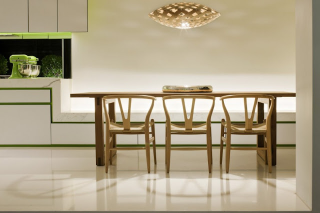 Three wooden chairs in the dining room