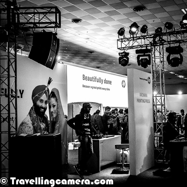 6th Jan 2013 was last day of Consumer Electronic Imaging Fair, which is popularly known as annual Photo Fair. It's a platform for Photography related businesses to showcase their products, technologies and innovations to Photographer community. This time Nikon and Canon were missing from this fair which was quite odd and overall excitement was also lesser. Let's check out this Photo Journey to know what else was there at Photo FairThis was the best part of Delhi Photo Fair 2013 ! Almost every branding poster had some very good messages writen, with significant real estate allocation to it. Messages like 'RESPECT WOMEN' and 'SAVE GIRL' etc. Big Thanks for Consumer Electronic Imaging Fair Organizers !!!In absence of Nikon and Canon, Sony was one of the biggest stall owner in Photo Fair. All registration counters had SONY branding and there was elaborated setup at Sony corner. There was a dedicated platform with some models and their mirriless cameras are feathered to screens around it. It was great to see a huge corner occupied by Xerox, the company which has contributed a lot to evolution of printing industry. In between, Xerox was lost somewhere and now seemed like a well equipment competitor for companies in printing domain. How can I miss the company which gifted a camera to me, few months back. Fujifilm is well equipped with different ranges of DLSRs & Mirroless cameras for serious photographers. Here is a view of Tamron corner where eminent Photographers Adarsh Anand and Eesh Diwan were sharing some tips about photography with audience. There was proper lighting with a backdrop and some models, so that folks could try their hands with suggested settings etc. Tamron is doing great in India Photography market and the way they are planning thing will take them to places. All the Best Tamron, although I am not sure how their products/lenses work with Nikon or Canon cameras, as I never used them. There were many other camera equipment, software, photo book and template companies who had experts at their stalls to answer Photographer's queries. It was amazing to interesting softwares created to solve some of the basic problems of Indian Photographers and wondering if these photographers will still go for branded softwares, when they get customized softwares. At the same time, how these companies are handling piracy problem in India. For next few weeks, I will be looking at some of the these softwares by Indian companies and how effective they are for non-studio photographers. Here is another big industry in Photography eco-system of India.  Album templates, Video templates for creating wedding albums or DVDs. There were plenty of companies to sell such stuff, along with some hardware for printing, binding and allDuring the visit, I was talking one of the Photographer and both of us felt that rates offered for camera equipments were comparatively high at the Fair. So folks in Delhi can get this stuff anytime at better rates in Chandani-Chowk.For some companies, it's just a platform to build their brand as many photographers from different parts of the country to Photo Fair. 'Organized biannually in Delhi by the All India Photographic Trade & Industry Association, Consumer Electronic Imaging Fair is the 3rd largest photography expo in the world and will feature not only the leading camera and lens manufacturers, but also multitude of small and home grown companies and shops, offering a glimpse and discounted pricing on their photographic and lab equipment and software. Making Consumer Electronic Imaging Fair a must visit for every photographer.We missed you Nikon and Canon !!! 