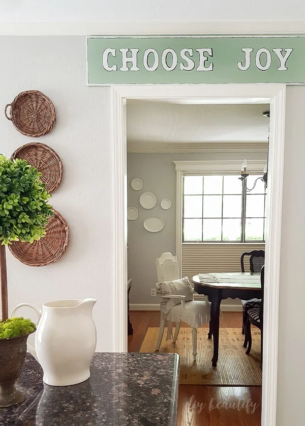 choose joy handmade sign and view of dining room